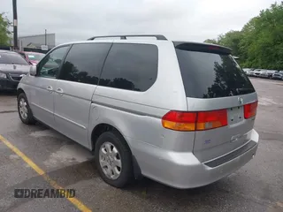 2004 Honda Odyssey EX-L with VIN 5FNRL18934B076486, listed as a IAAI auction lot 42315160 with 209,467 mi miles and . Bid and sale history available at DreamBid. Image 3.