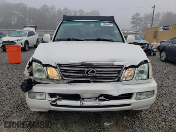 2004 Lexus LX 470 with VIN JTJHT00W343547828, listed as a Copart auction lot 48982045 with 196,877 mi miles and Salvage Title. Bid and sale history available at DreamBid. Image 5.