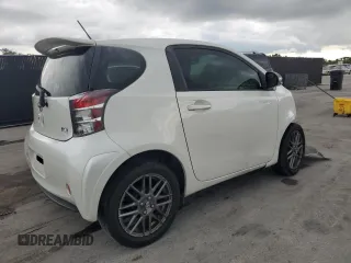 2013 Scion iQ with VIN JTNJJXB01DJ022687, listed as a Copart auction lot 61918195 with 117,483 mi miles and Salvage title. Bid and sale history available at DreamBid. Image 3.