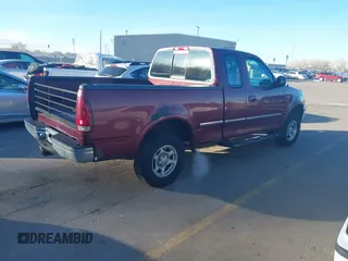 1997 Ford F-150 XL with VIN 1FTDX1869VKA51231, listed as a IAAI auction lot 41846817 with 297,327 mi miles. Bid and sale history available at carsss.com. Image 4.