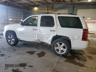 2007 Chevrolet Tahoe LTZ with VIN 1GNFK13007J313566, listed as a Copart auction lot 52498975 with 234,744 mi miles and Salvage title. Bid and sale history available at DreamBid. Image 2.