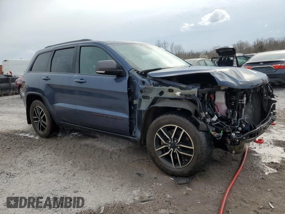2021 Jeep Grand Cherokee Trailhawk with VIN 1C4RJFLT7MC606333, listed as a Copart auction lot 47632745 with 51,582 mi miles and Salvage Title. Bid and sale history available at carsss.com. Image 4.