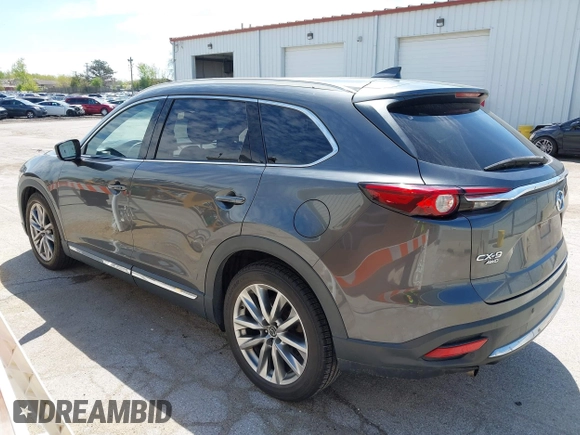 2016 Mazda CX-9 Signature with VIN JM3TCBEY2G0124433, listed as a IAAI auction lot 42194154 with 108,945 mi miles and . Bid and sale history available at DreamBid. Image 3.