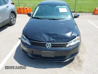2012 Volkswagen Jetta Sedan SE w/Convenience & Sunroof with VIN 3VWDX7AJ4CM107290, listed as a IAAI auction lot 42142201 with 132,122 mi miles. Bid and sale history available at carsss.com. Image 6.