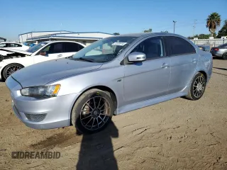 2015 Mitsubishi Lancer ES with VIN JA32U2FU4FU021260, listed as a Copart auction lot 77233514 with 99,548 mi miles and Salvage Title. Bid and sale history available at carsss.com. Image 1.