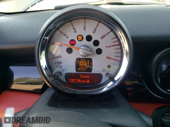 2012 MINI Hardtop with VIN WMWSU3C53CT369974, listed as a Copart auction lot 53238895 with 130,734 mi miles and Salvage Title. Bid and sale history available at DreamBid. Image 9.