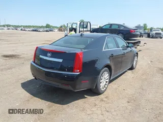2012 Cadillac CTS z VIN 1G6DC5E52C0142318, wystawiony jako IAAI lot #42413205 z przebiegiem 100 694 mil mil oraz . Historia ofert i sprzedaży dostępna na DreamBid. Obrazek 4.