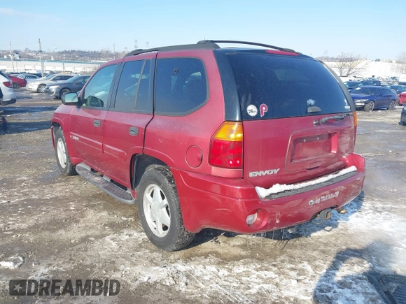 2003 GMC Envoy SLE with VIN 1GKDT13S732131869, listed as a IAAI auction lot 41422135 with 163,193 mi miles. Bid and sale history available at carsss.com. Image 3.
