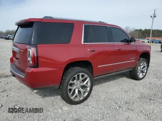 2015 GMC Yukon Denali with VIN 1GKS2CKJXFR180512, listed as a Copart auction lot 48249475 with 209,477 mi miles and Salvage Title. Bid and sale history available at carsss.com. Image 3.