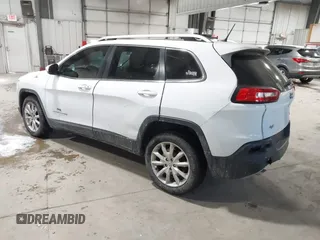 2014 Jeep Cherokee Limited with VIN 1C4PJLDS3EW283569, listed as a IAAI auction lot 41589298 with 128,307 mi miles. Bid and sale history available at carsss.com. Image 3.