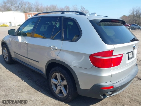 2009 BMW X5 30i with VIN 5UXFE435X9L272544, listed as a IAAI auction lot 42017376 with 118,793 mi miles. Bid and sale history available at carsss.com. Image 3.