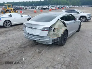 2017 Tesla Model S 100D с VIN 5YJSA1E28HF199687, выставлен на аукционе IAAI как лот 42353657 с пробегом 68 533 миль миль и . История ставок и продаж доступна на DreamBid. Изображение 4.