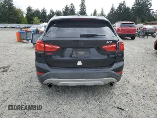 2017 BMW X1 xDrive28i z VIN WBXHT3Z37H4A54088, wystawiony jako Copart lot #56209195 z przebiegiem 135 026 mil mil oraz Tytuł czysty. Historia ofert i sprzedaży dostępna na DreamBid. Obrazek 6.