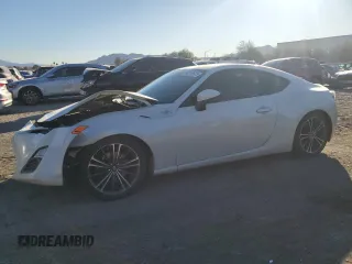 2013 Scion FR-S z VIN JF1ZNAA1XD1731496, wystawiony jako Copart lot #88248615 z przebiegiem 150 921 mil mil oraz Szkoda całkowita • Salvage title. Historia ofert i sprzedaży dostępna na DreamBid. Obrazek 1.