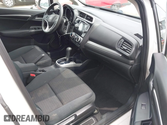 2020 Honda Fit LX with VIN 3HGGK5H44LM718313, listed as a IAAI auction lot 42358302 with 63,964 mi miles and . Bid and sale history available at DreamBid. Image 5.