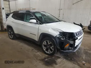 2018 Jeep Compass Limited with VIN 3C4NJDCB1JT212613, listed as a Copart auction lot 58320955 with 124,242 mi miles and Salvage title. Bid and sale history available at DreamBid. Image 4.