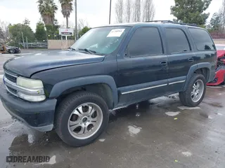 2001 Chevrolet Tahoe LS with VIN 1GNEK13T11R167502, listed as a IAAI auction lot 41798564 with 229,633 mi miles. Bid and sale history available at carsss.com. Image 2.