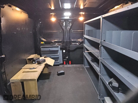 2015 Ford Transit Cargo с VIN 1FTYE1YM2FKA21561, выставлен на аукционе Copart как лот 86949274 с пробегом 160 535 миль миль и Чистый • Clean title. История ставок и продаж доступна на DreamBid. Изображение 10.