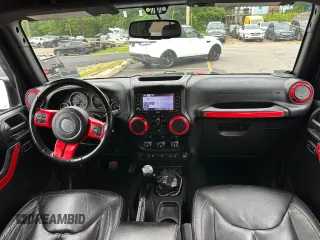 2015 Jeep Wrangler Unlimited Rubicon z VIN 1C4BJWFG2FL541572, wystawiony jako Copart lot #61723875 z przebiegiem 163 169 mil mil oraz Czysty tytuł • Clean title. Historia ofert i sprzedaży dostępna na DreamBid. Obrazek 6.