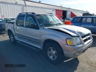 2004 Ford Explorer Sport Trac XLS z VIN 1FMDU77K74UB69268, wystawiony jako IAAI lot #42055157 z przebiegiem 127 573 mil mil oraz . Historia ofert i sprzedaży dostępna na DreamBid. Obrazek 1.