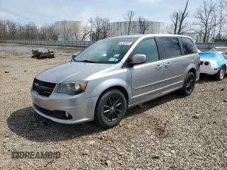 2014 Dodge Grand Caravan SXT with VIN 2C4RDGCG4ER114464, listed as a Copart auction lot 52480965 with 125,212 mi miles and Salvage Title. Bid and sale history available at DreamBid. Image 1.