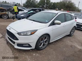 2015 Ford Focus ST with VIN 1FADP3L91FL268867, listed as a IAAI auction lot 41583424 with 169,426 mi miles. Bid and sale history available at carsss.com. Image 2.