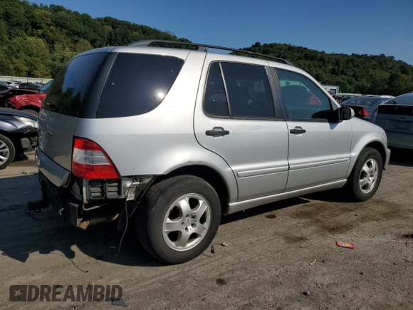 2002 Mercedes-Benz M-Class with VIN 4JGAB54E52A337189, listed as a Copart auction lot 71348154 with 220,378 mi miles and Salvage Title. Bid and sale history available at carsss.com. Image 3.