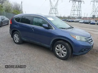 2014 Honda CR-V EX-L with VIN 5J6RM4H71EL092983, listed as a IAAI auction lot 42018356 with 136,024 mi miles. Bid and sale history available at carsss.com. Image 1.