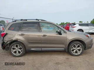 2017 Subaru Forester Touring z VIN JF2SJAWC6HH529707, wystawiony jako IAAI lot #42401138 z przebiegiem 172 868 mil mil oraz . Historia ofert i sprzedaży dostępna na DreamBid. Obrazek 13.