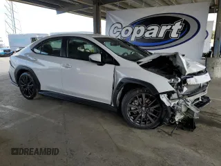2023 Subaru WRX Premium z VIN JF1VBAF60P9812766, wystawiony jako Copart lot #55696695 z przebiegiem 25 894 mil mil oraz Szkoda całkowita • Salvage title. Historia ofert i sprzedaży dostępna na DreamBid. Obrazek 4.