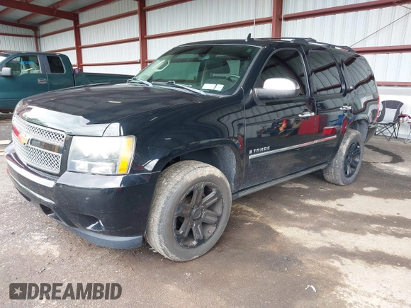 2009 Chevrolet Tahoe LTZ z VIN 1GNFK330X9R219064, wystawiony jako IAAI lot #42261154 z przebiegiem 125 511 mil mil oraz . Historia ofert i sprzedaży dostępna na DreamBid. Obrazek 17.