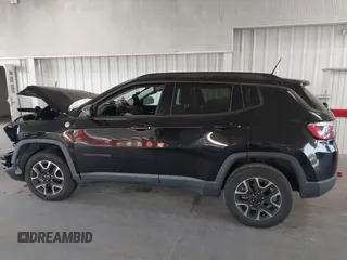 2020 Jeep Compass Trailhawk with VIN 3C4NJDDB3LT170463, listed as a IAAI auction lot 42446080 with 83,336 mi miles and . Bid and sale history available at DreamBid. Image 15.
