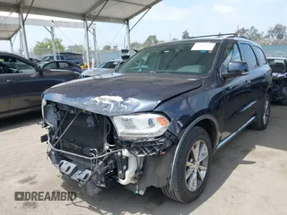 2014 Dodge Durango Limited with VIN 1C4RDHDG6EC975934, listed as a IAAI auction lot 42416833 with 158,266 mi miles and . Bid and sale history available at DreamBid. Image 2.