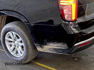 2022 Chevrolet Tahoe LS z VIN 1GNSKMKD7NR129745, wystawiony jako IAAI lot #42566236 z przebiegiem 95 126 mil mil oraz . Historia ofert i sprzedaży dostępna na DreamBid. Obrazek 19.