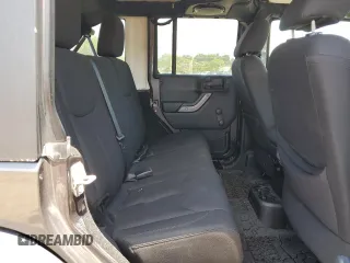 2014 Jeep Wrangler Unlimited Sport with VIN 1C4BJWDG1EL298161, listed as a Copart auction lot 61996735 with 176,043 mi miles and Salvage title. Bid and sale history available at DreamBid. Image 11.