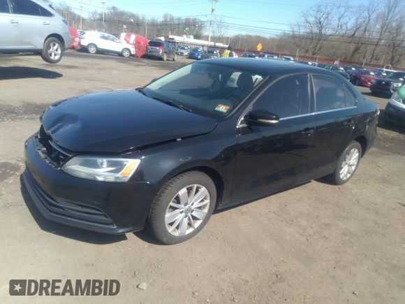 2016 Volkswagen Jetta Sedan 1.4T SE with VIN 3VWD67AJXGM242539, listed as a IAAI auction lot 38948493 with 121,876 mi miles. Bid and sale history available at carsss.com. Image 2.