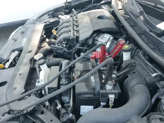 2019 Nissan Sentra S z VIN 3N1AB7AP4KY370902, wystawiony jako IAAI lot #42790974 z przebiegiem 100 917 mil mil oraz . Historia ofert i sprzedaży dostępna na DreamBid. Obrazek 19.