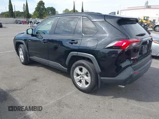 2019 Toyota RAV4 XLE with VIN JTMW1RFV7KJ011556, listed as a IAAI auction lot 41682178 with 72,795 mi miles. Bid and sale history available at carsss.com. Image 3.