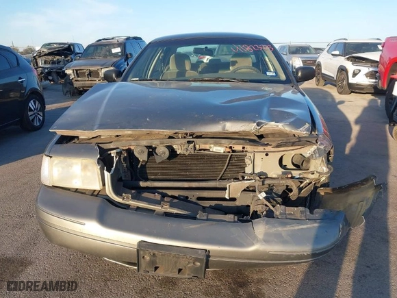 2004 Ford Crown Victoria Standard with VIN 2FAFP73W64X107579, listed as a IAAI auction lot 41823273 with 131,921 mi miles. Bid and sale history available at carsss.com. Image 13.