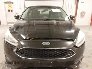 2015 Ford Focus SE with VIN 1FADP3F24FL255450, listed as a IAAI auction lot 41673301 with 103,650 mi miles. Bid and sale history available at carsss.com. Image 6.