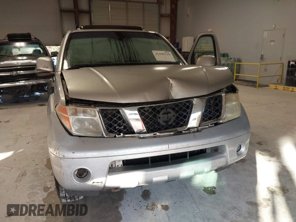 2005 Nissan Pathfinder SE with VIN 5N1AR18UX5C749610, listed as a IAAI auction lot 41109719 with 230,042 mi miles. Bid and sale history available at carsss.com. Image 6.
