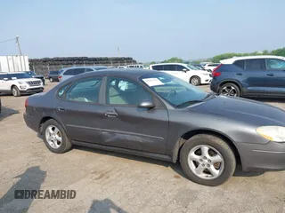 2003 Ford Taurus SE Standard with VIN 1FAFP53203G173180, listed as a IAAI auction lot 42495369 with 129,091 mi miles and . Bid and sale history available at DreamBid. Image 6.