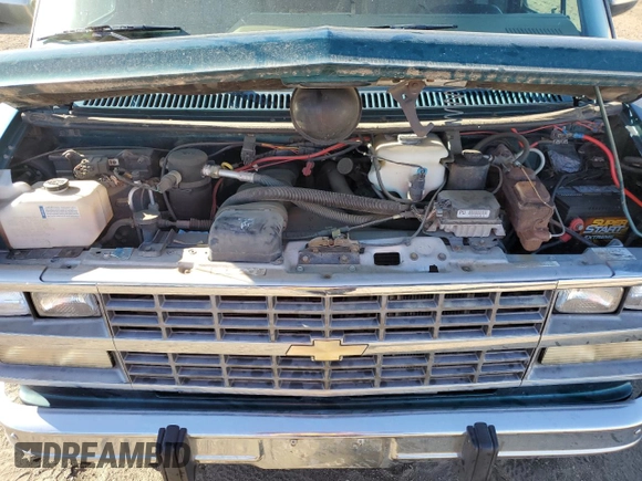 1995 Chevrolet Chevy Van z VIN 1GBEG25K3SF249372, wystawiony jako Copart lot #72284224 z przebiegiem 72 331 mil mil oraz Tytuł czysty. Historia ofert i sprzedaży dostępna na DreamBid. Obrazek 12.
