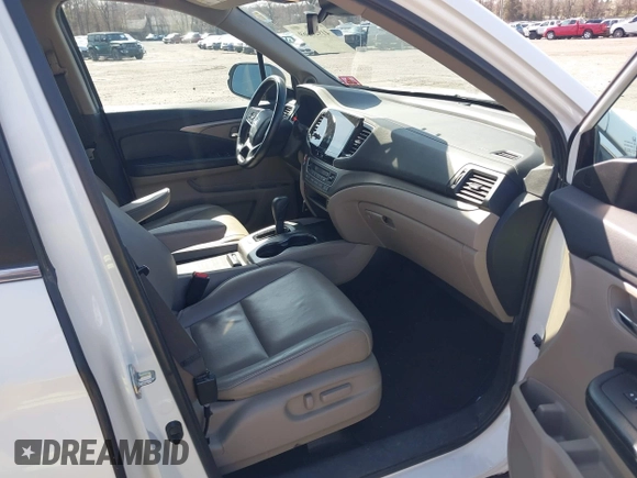 2019 Honda Pilot EX-L with VIN 5FNYF6H51KB052648, listed as a IAAI auction lot 41928269 with 67,878 mi miles and . Bid and sale history available at carsss.com. Image 5.