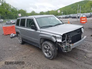 2014 Jeep Patriot Sport z VIN 1C4NJRBBXED784029, wystawiony jako IAAI lot #42221800 z przebiegiem 80 565 mil mil oraz . Historia ofert i sprzedaży dostępna na DreamBid. Obrazek 1.