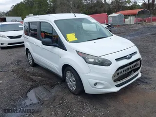 2015 Ford Transit Connect Wagon XLT with VIN NM0AE8F7XF1219105, listed as a IAAI auction lot 41237462 with 135,209 mi miles. Bid and sale history available at carsss.com. Image 1.