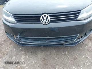 2013 Volkswagen Jetta SE z VIN 3VWDX7AJ5DM258429, wystawiony jako IAAI lot #42372776 z przebiegiem 211 579 mil mil oraz . Historia ofert i sprzedaży dostępna na DreamBid. Obrazek 6.