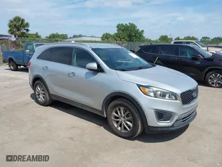 2016 Kia Sorento LX with VIN 5XYPG4A54GG009459, listed as a IAAI auction lot 42113972 with 158,950 mi miles. Bid and sale history available at carsss.com. Image 1.