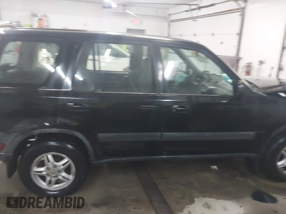2000 Honda CR-V EX with VIN JHLRD1865YS007202, listed as a IAAI auction lot 41801108 with 134,387 mi miles. Bid and sale history available at carsss.com. Image 13.