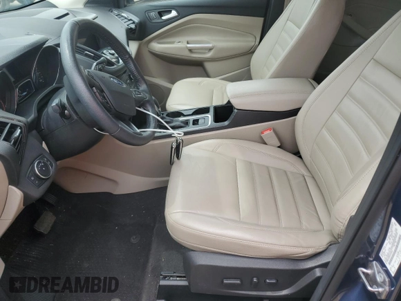 2018 Ford Escape Titanium with VIN 1FMCU9J93JUC01903, listed as a Copart auction lot 57337045 with 59,276 mi miles and Salvage title. Bid and sale history available at DreamBid. Image 7.